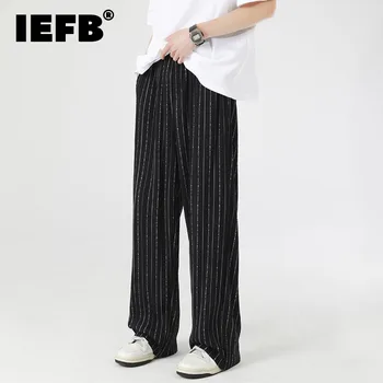 IEFB פסים וילון רחב הרגל מכנסיים רופפים ישר מזדמן 2023 הקיץ ניגודיות צבע זכר מכנסיים אופנה קוריאנית 9A8008